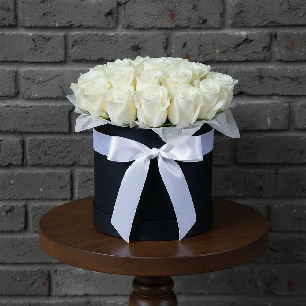 Цветочная композиция из Розы в шляпной коробке в Путевке