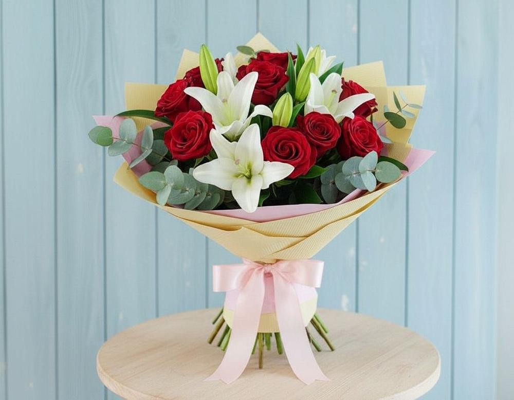Букет цветов из: Лилии и Розы в Путевке